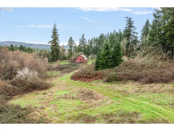 a picture of a bathroom with a shower