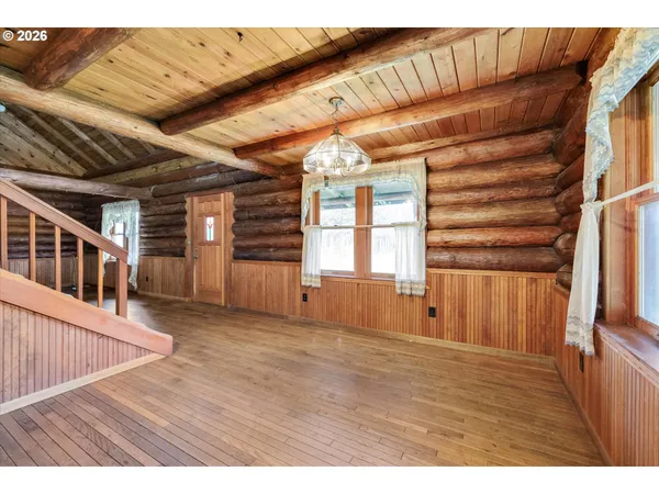 a kitchen with sink a stove and cabinets
