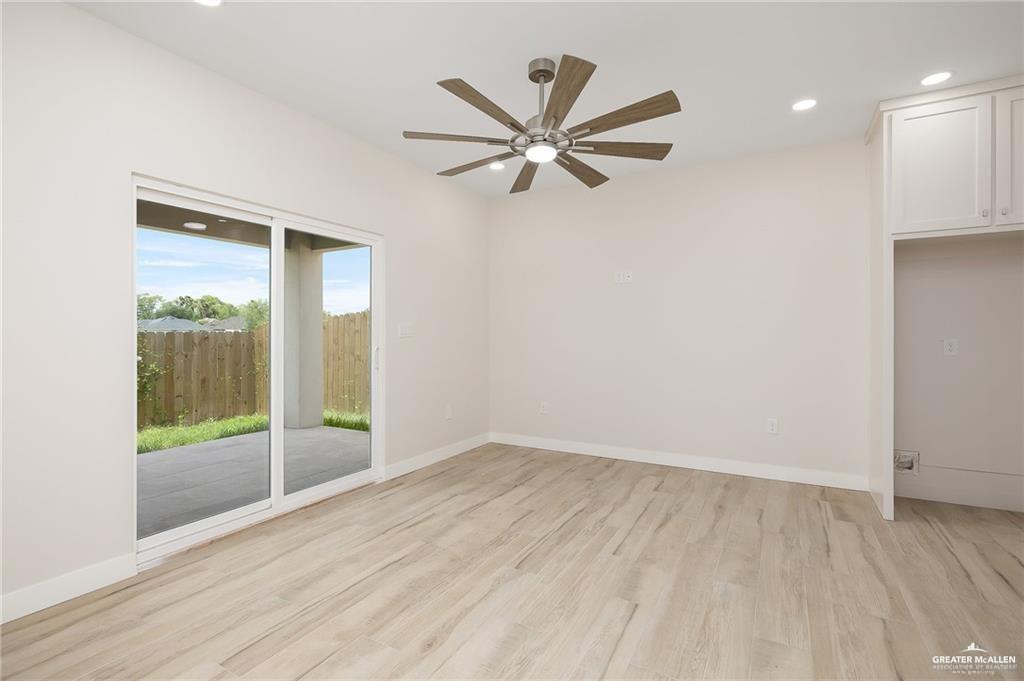 2508 East Solar Drive Mission, TX 78574 - Photo 6 of 13 a view of a livingroom with a ceiling fan and window