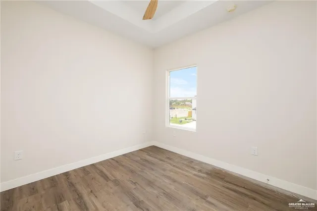 a view of an empty room and window
