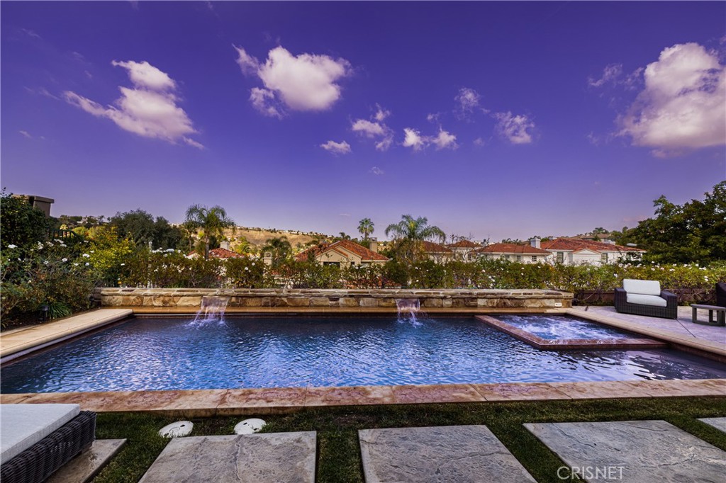 3626 Paseo Primario Calabasas, CA 91302 - Photo 30 of 41 a view of a lake with a mountain