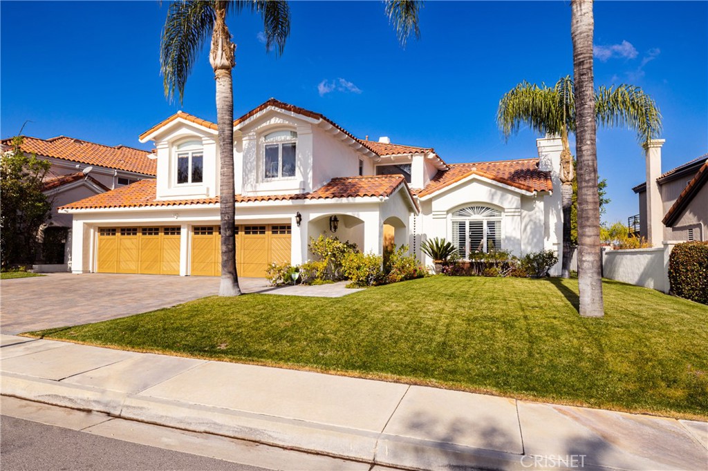 3626 Paseo Primario Calabasas, CA 91302 - Photo 3 of 41 a front view of a house with garden