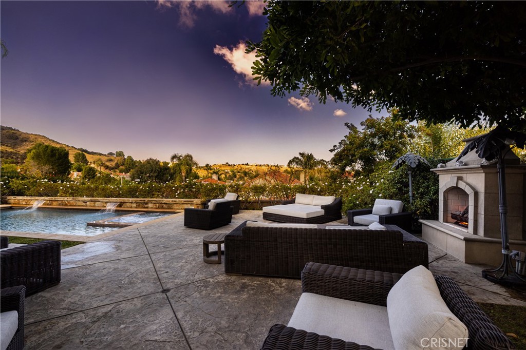 3626 Paseo Primario Calabasas, CA 91302 - Photo 32 of 41 a view of a terrace with couches and a table
