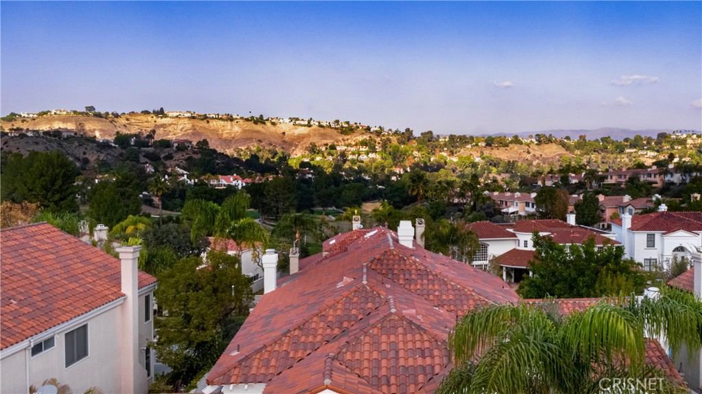 3626 Paseo Primario Calabasas, CA 91302 - Photo 36 of 41 a view of a city with sunset