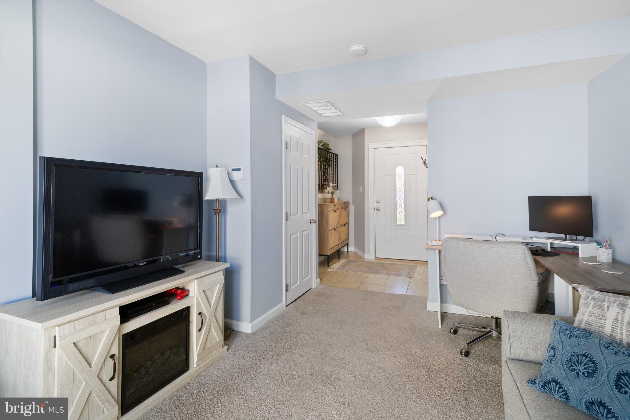 1277 Beverly Road Warminster, PA 18974 - Photo 8 of 38 a view of a livingroom with entryway and flat screen tv