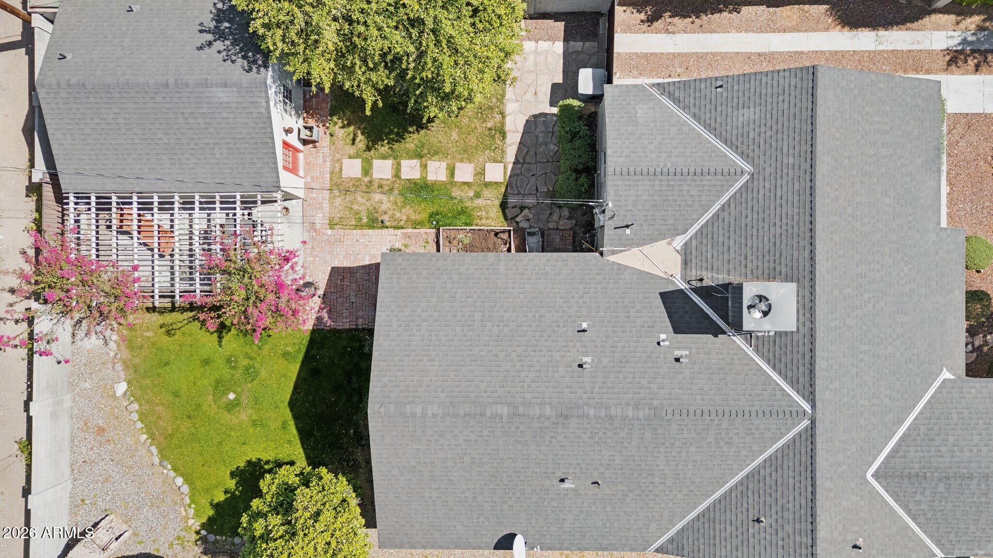 322 West Coronado Road Phoenix, AZ 85003 - Photo 78 of 93 an aerial view of a house with swimming pool and large trees