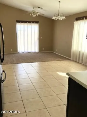a view of livingroom with kitchen