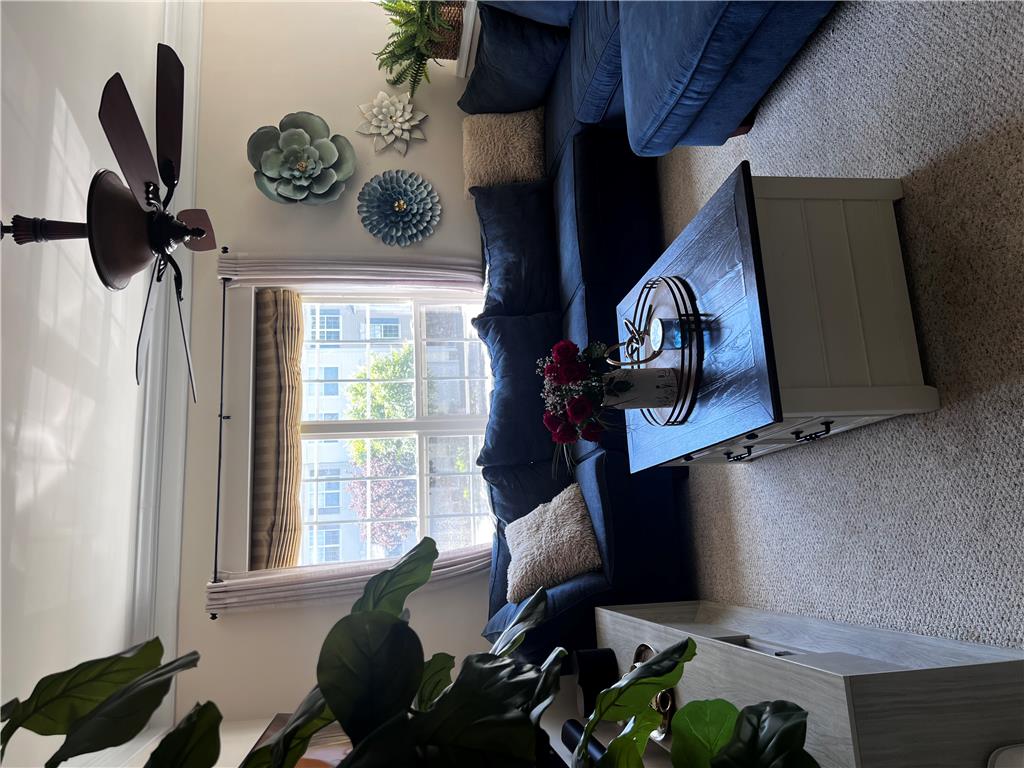 8549 Gateway Road Breinigsville, PA 18031 - Photo 6 of 26 Relax in this inviting living area featuring a ceiling fan and large window with exterior views.