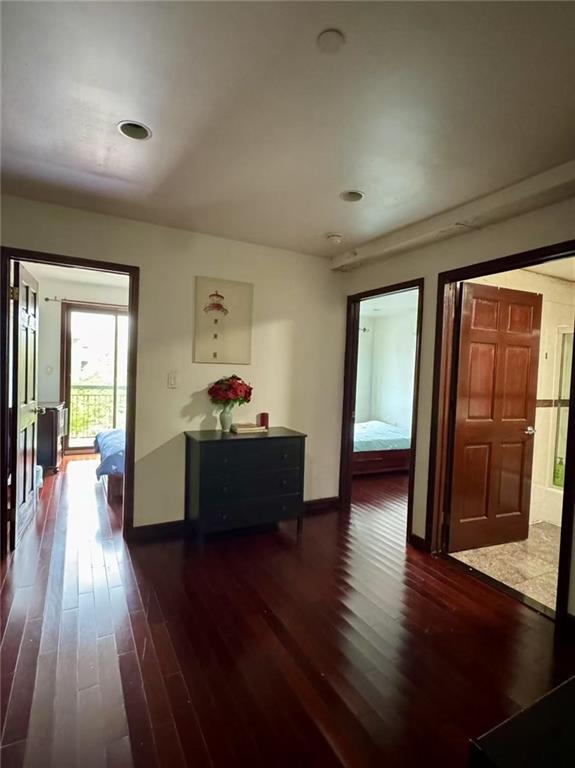 720 57th Street, Unit 4E Brooklyn, NY 11220 - Photo 2 of 4 a living room with furniture and a wooden floor