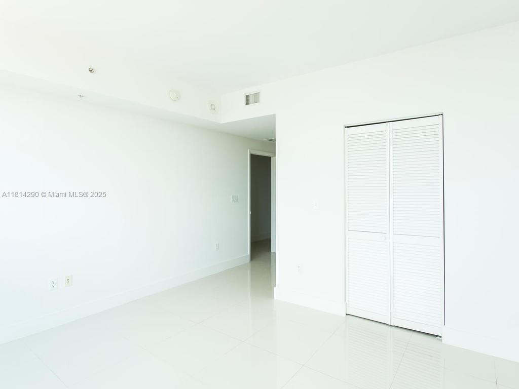 244 Biscayne Boulevard, Unit 2002 Miami, FL 33132 - Photo 16 of 21 a view of a closet