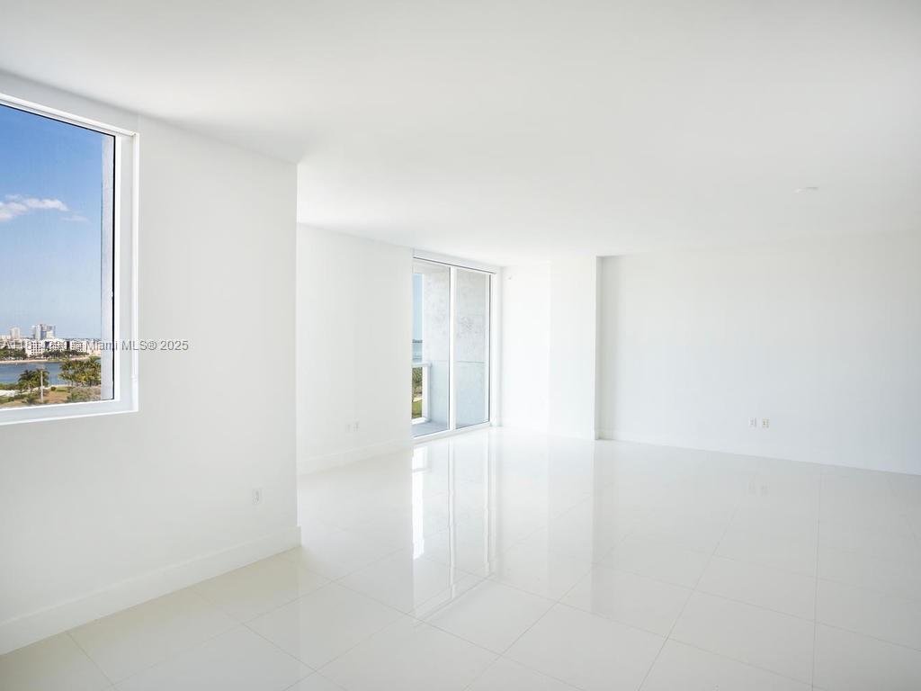 244 Biscayne Boulevard, Unit 2002 Miami, FL 33132 - Photo 3 of 21 a view of an empty room