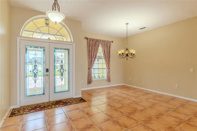 a kitchen with a sink and a stove top oven