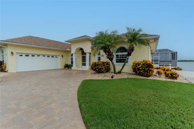 a view of a livingroom with furniture and a window