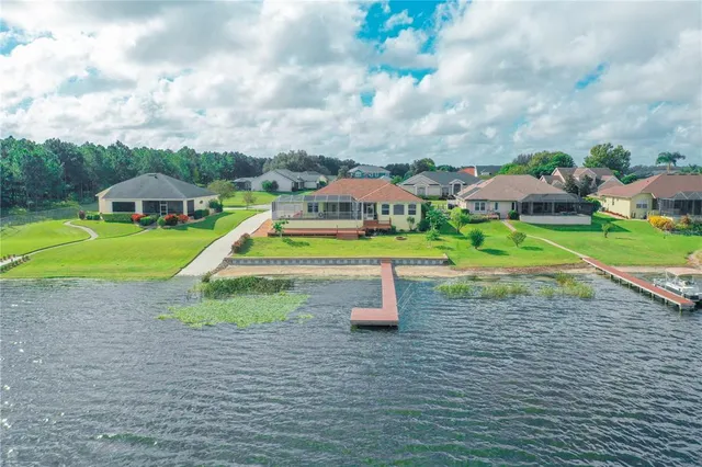 a view of a garden with an outdoor seating
