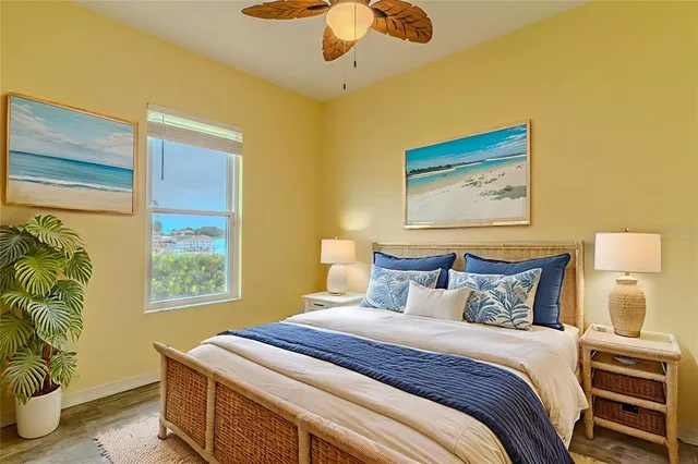 en empty room with windows and chandelier