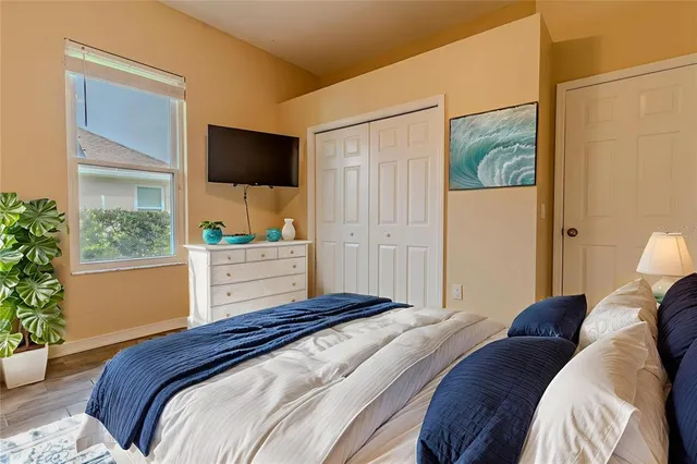 a kitchen with stainless steel appliances granite countertop a stove a sink and a window