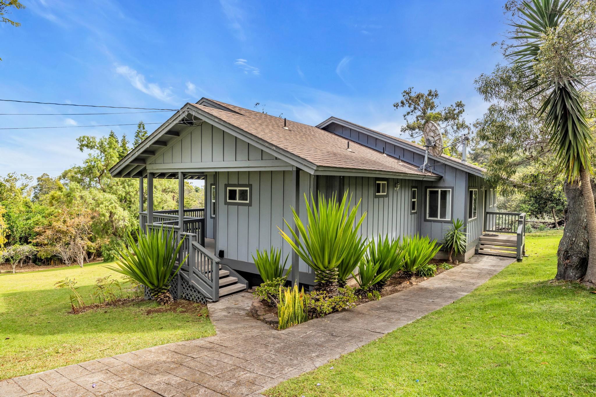 115 Alae Road Kula, HI 96790 - Photo 35 of 50 a front view of a house with garden