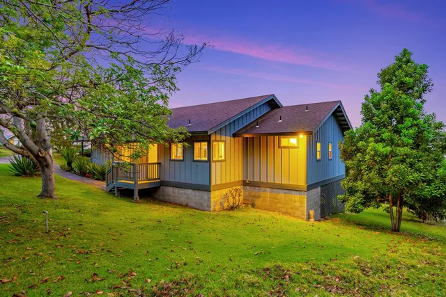 front view of a house with a big yard