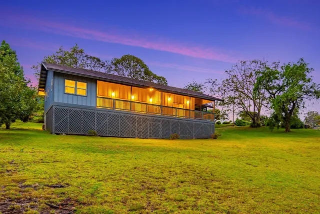 a view of a house with a swimming pool