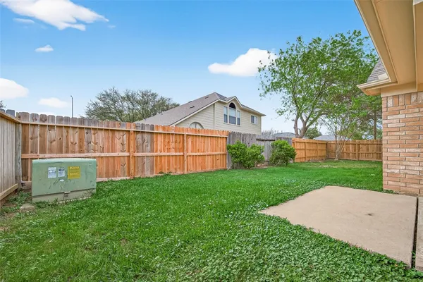 a view of a backyard with a garden