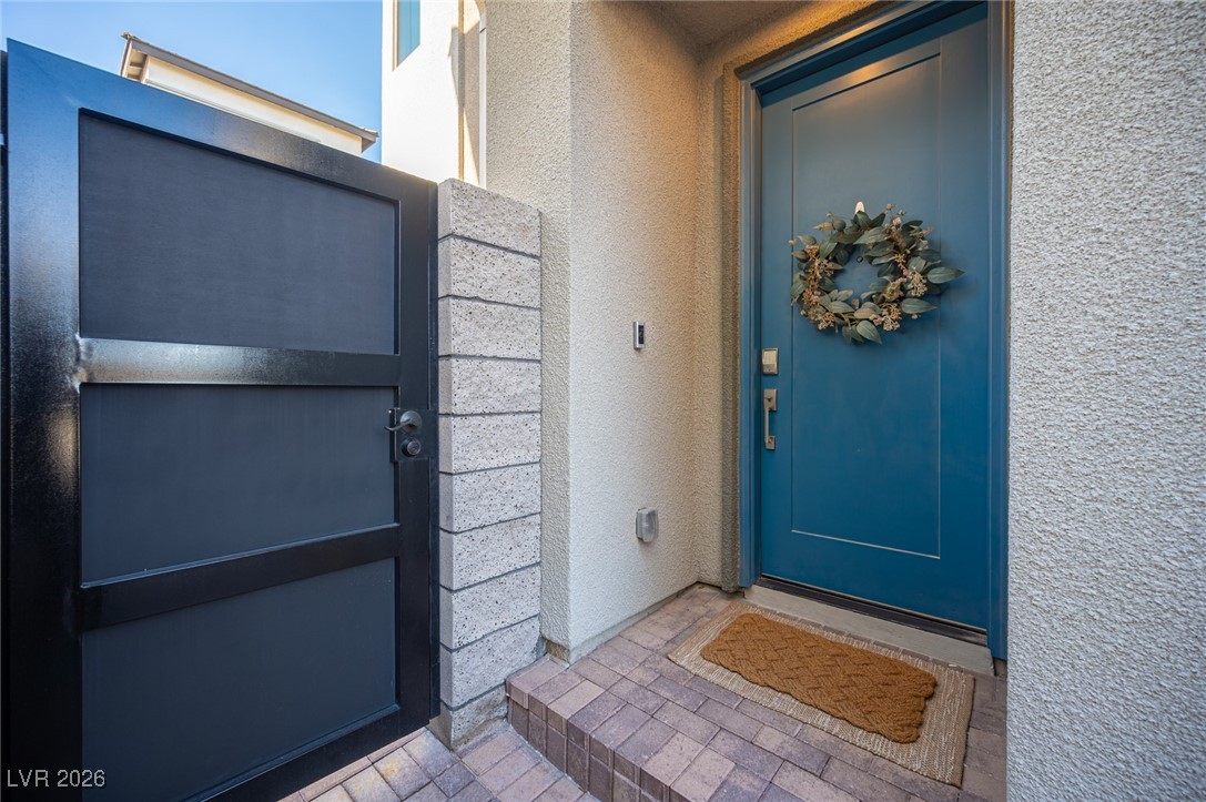 9240 Rampa Street Las Vegas, NV 89166 - Photo 2 of 28 Front Door, Upgraded Side Gate, & Ring Doorbell Included