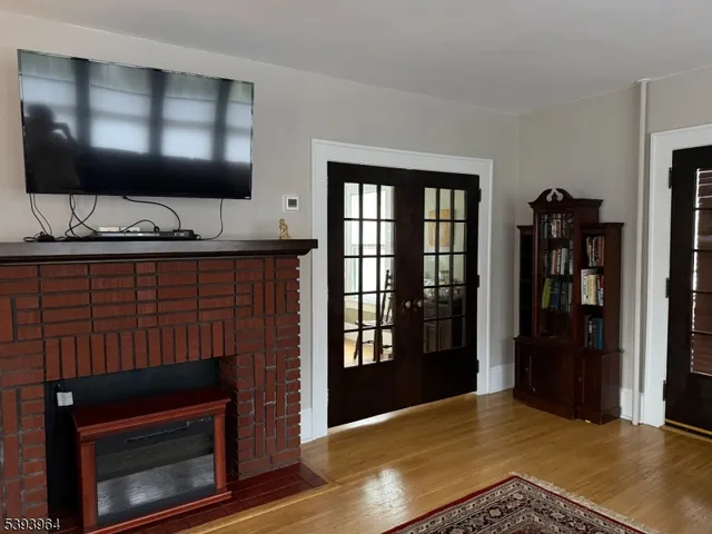 a kitchen with stainless steel appliances granite countertop a stove microwave and refrigerator