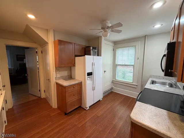 a room with furniture and wooden floor