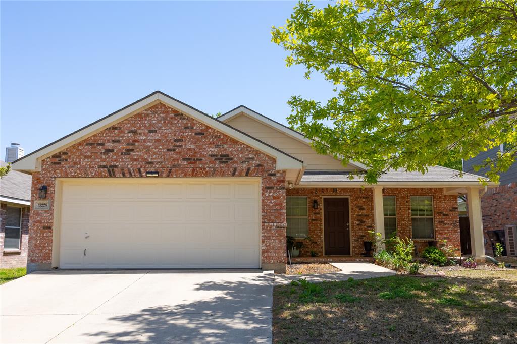 13228 Harvest Ridge Road Fort Worth, TX 76244 - Photo 1 of 1 a view of a house with a tree in front of it