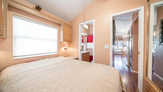 a view of room with furniture and wooden floor