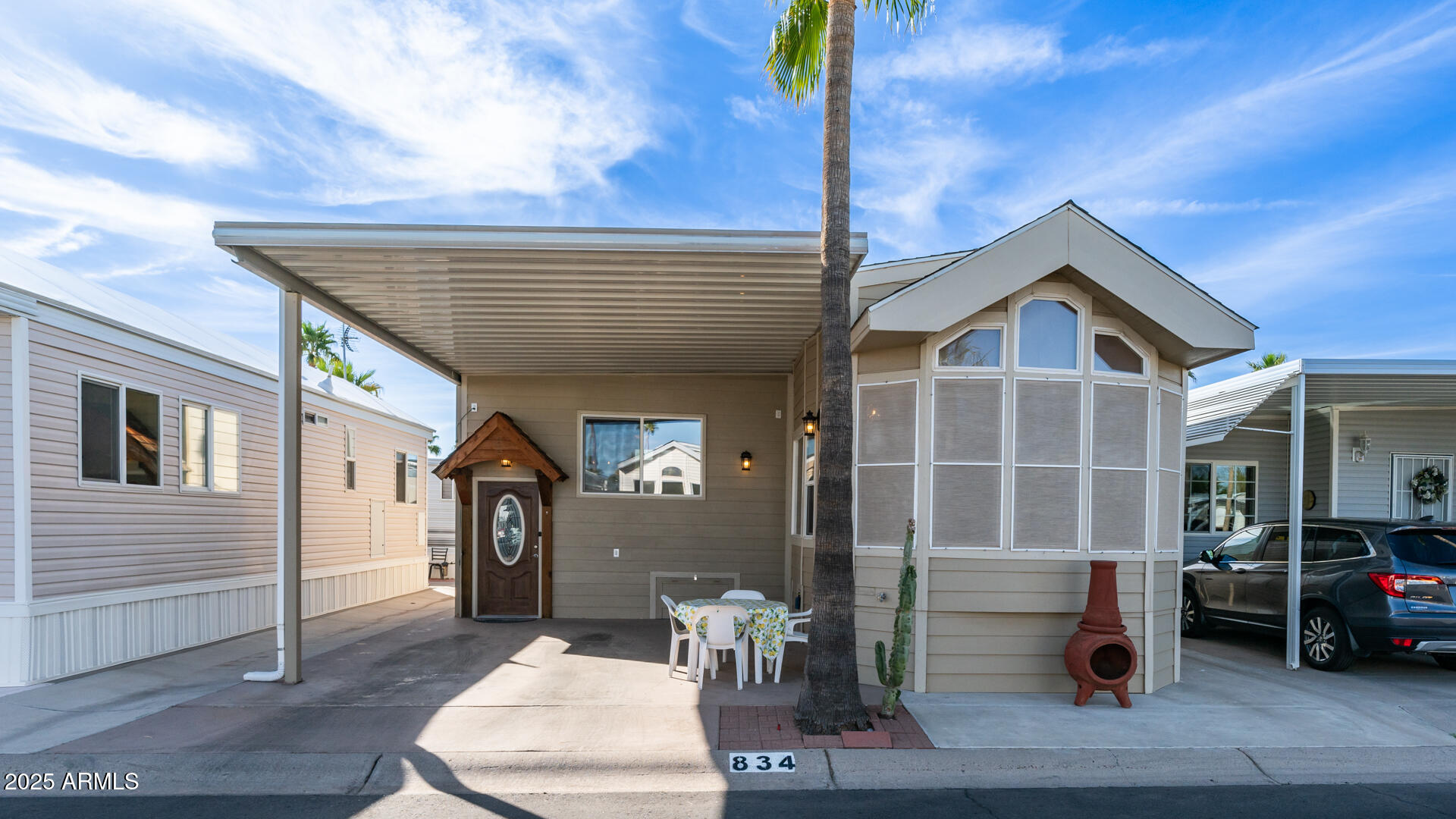 834-837 South Beryl/aquamarine Drive Apache Junction, AZ 85119 - Photo 3 of 68 a front view of a house with a yard