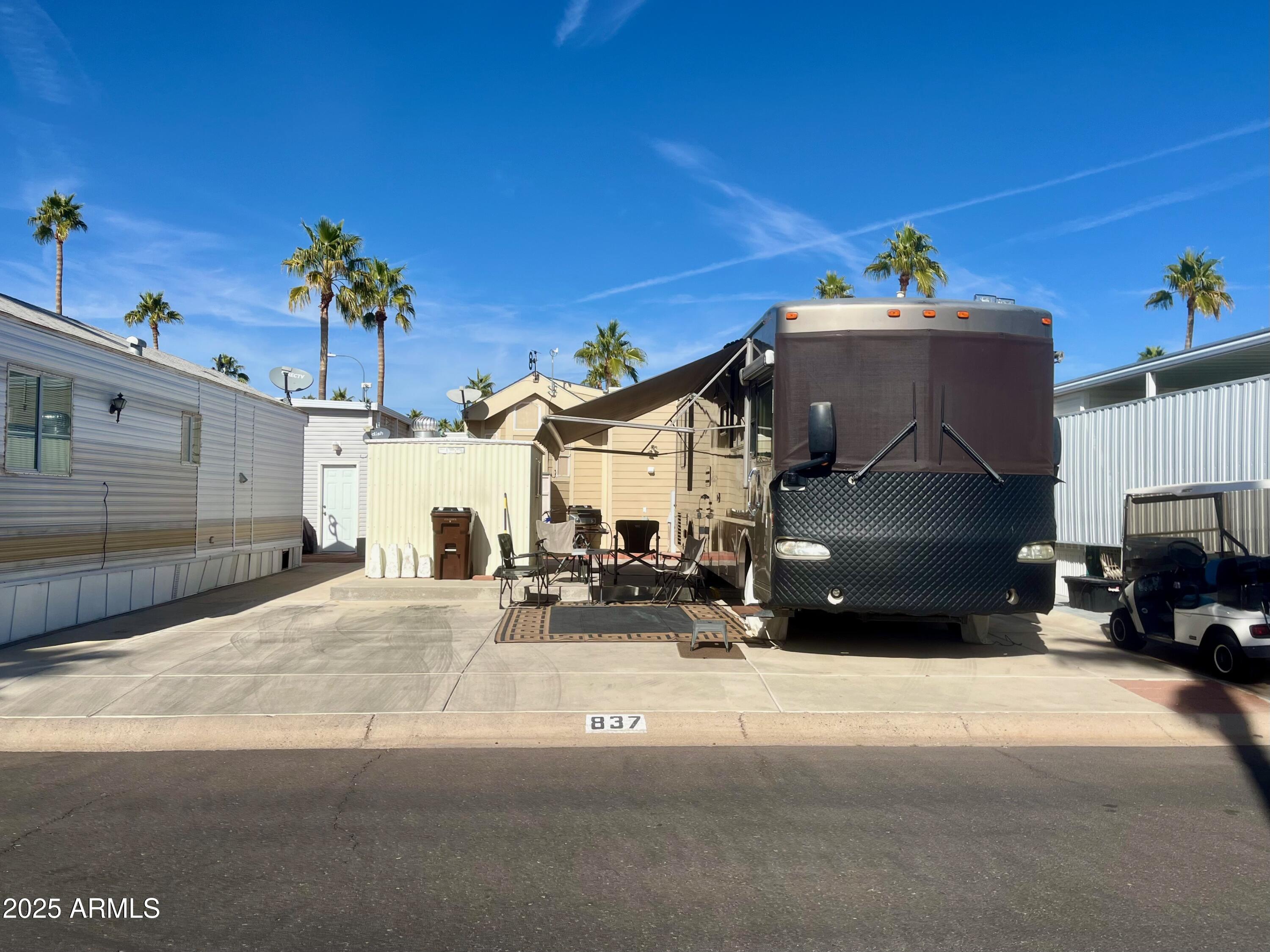 834-837 South Beryl/aquamarine Drive Apache Junction, AZ 85119 - Photo 35 of 68 a view of a house with a patio