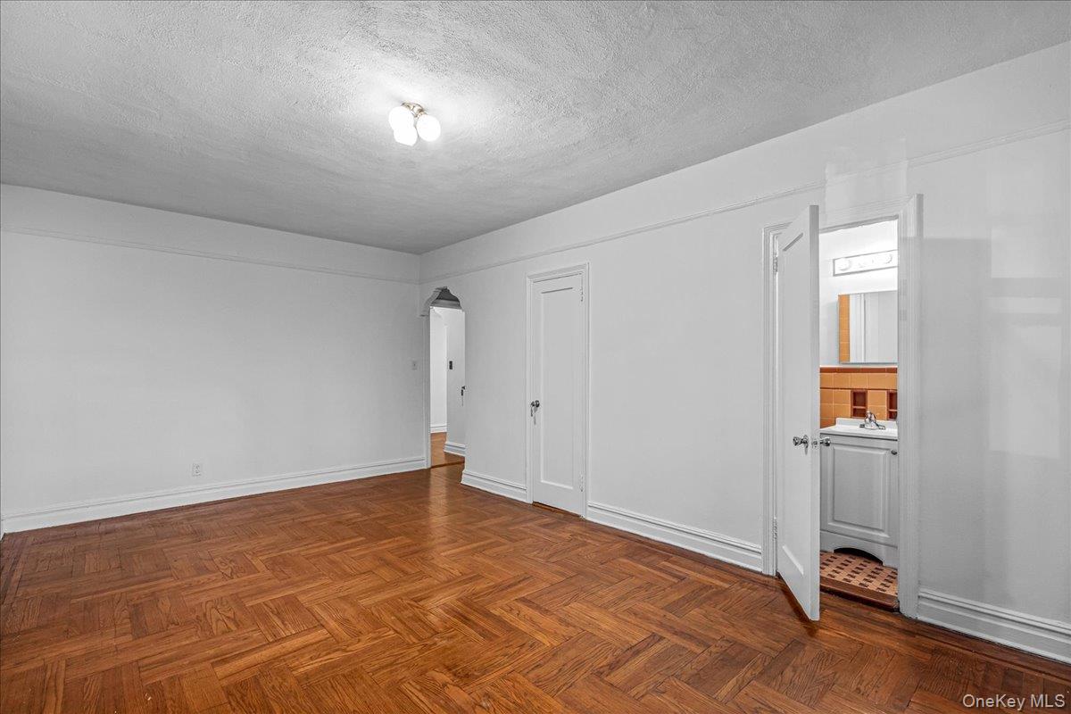 35-30 73rd Street, Unit 1F Queens, NY 11372 - Photo 17 of 24 an empty room with windows