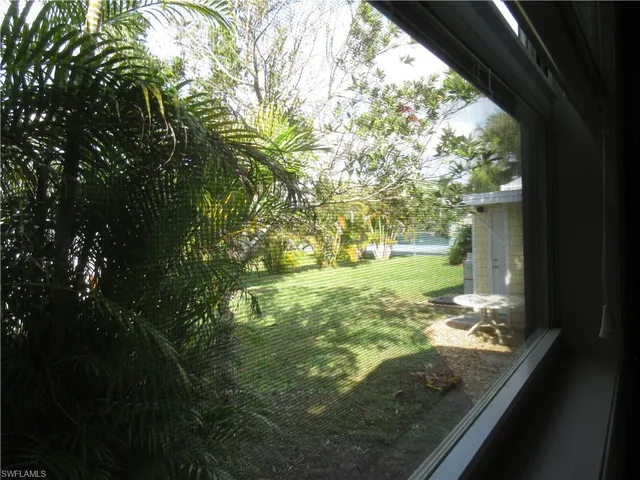 a view of outdoor space and swimming pool