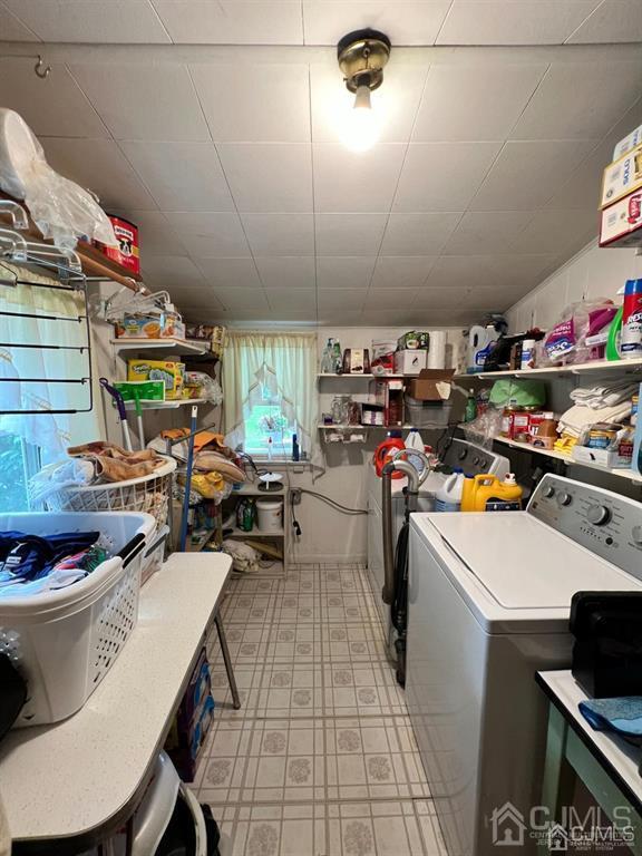 21 White Pine Road North Brunswick, NJ 08902 - Photo 11 of 33 a kitchen with a sink a stove and lots of counter space