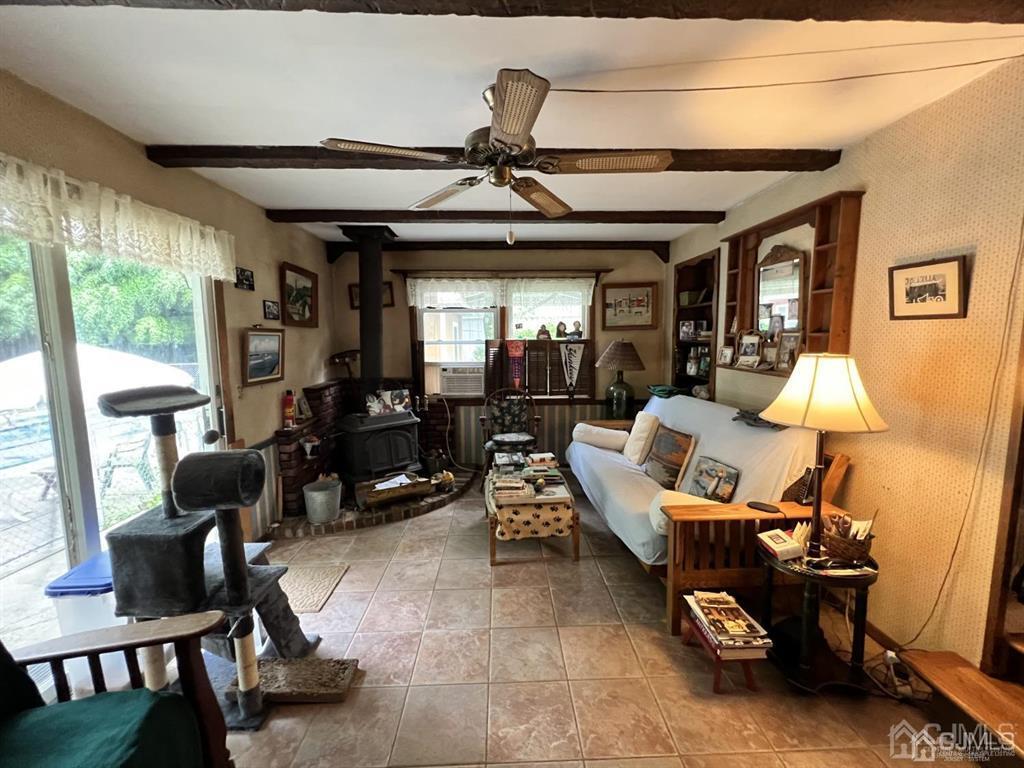 21 White Pine Road North Brunswick, NJ 08902 - Photo 12 of 33 a living room with furniture and a large window