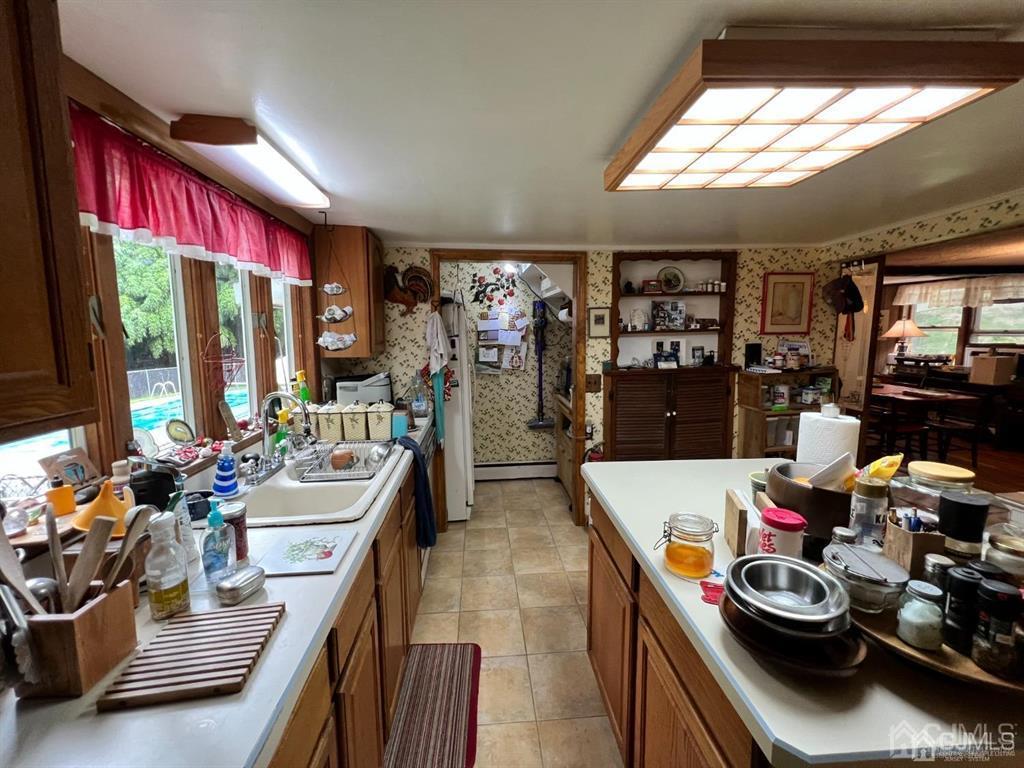 21 White Pine Road North Brunswick, NJ 08902 - Photo 17 of 33 a room with furniture a gym equipment and a large window