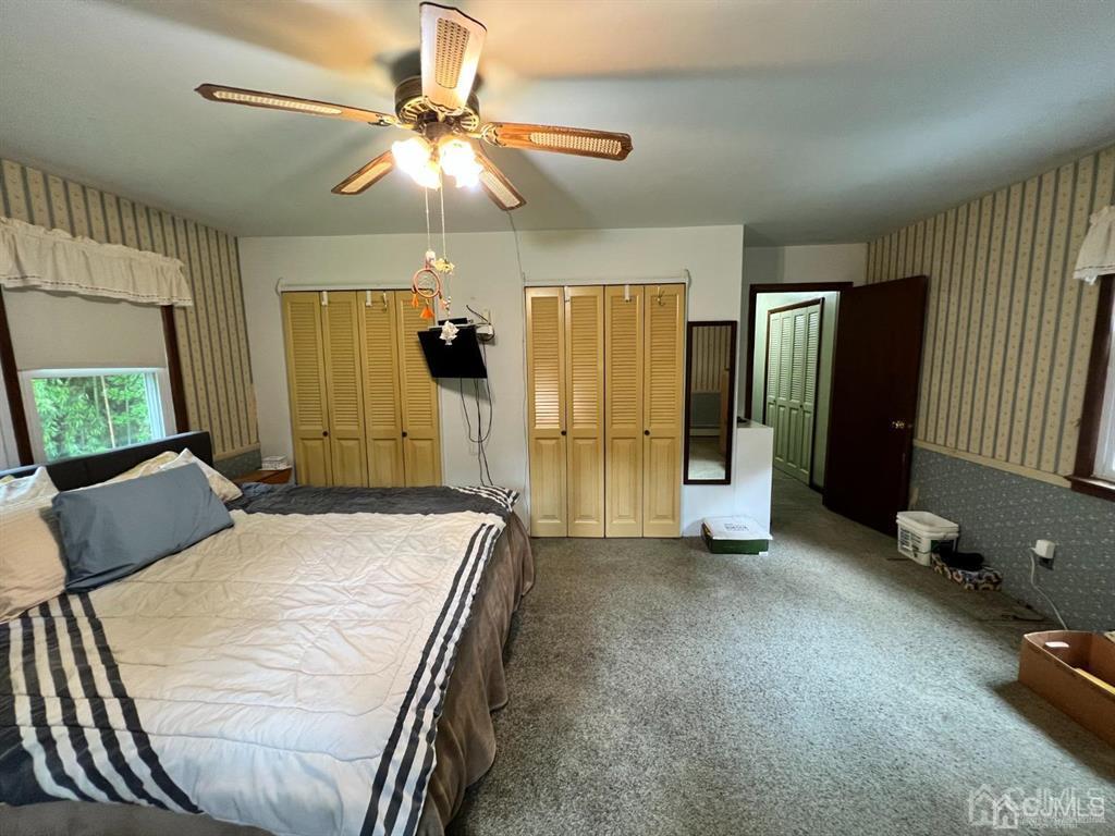 21 White Pine Road North Brunswick, NJ 08902 - Photo 27 of 33 a view of work space with furniture and a chandelier fan