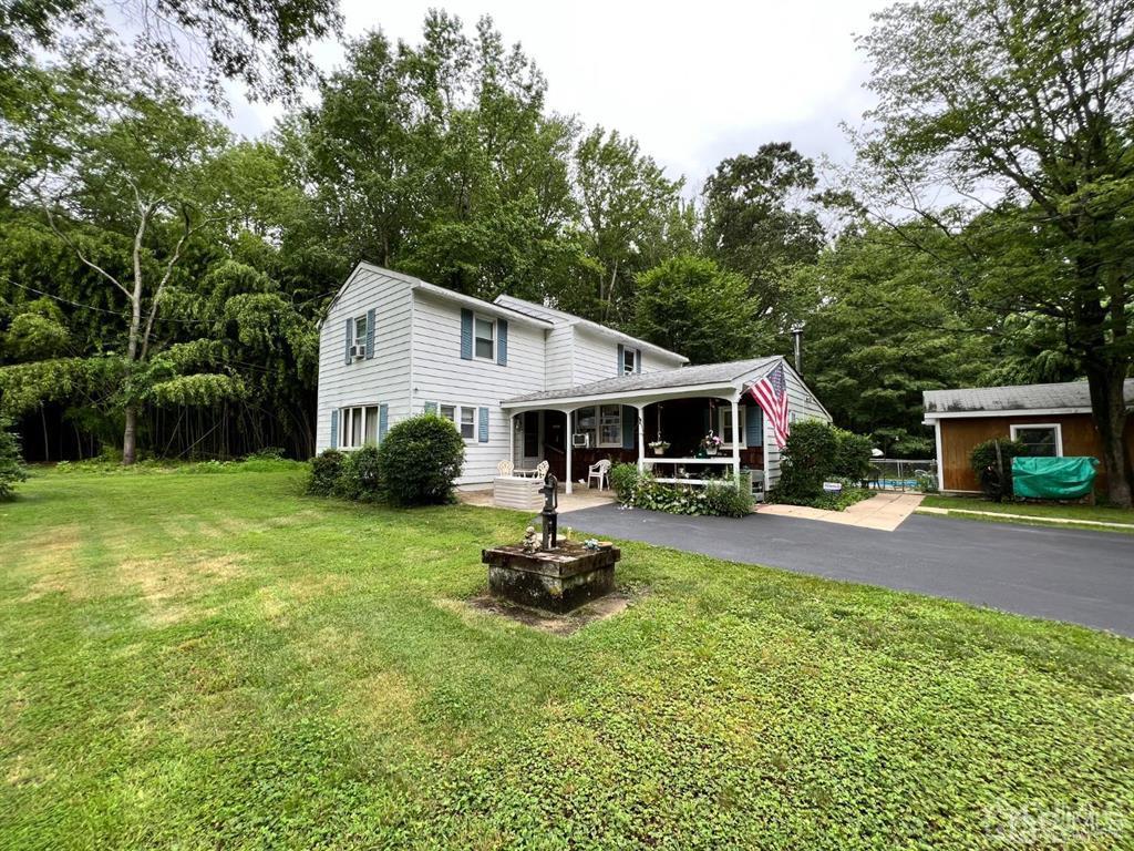 21 White Pine Road North Brunswick, NJ 08902 - Photo 3 of 33 a front view of a house with garden