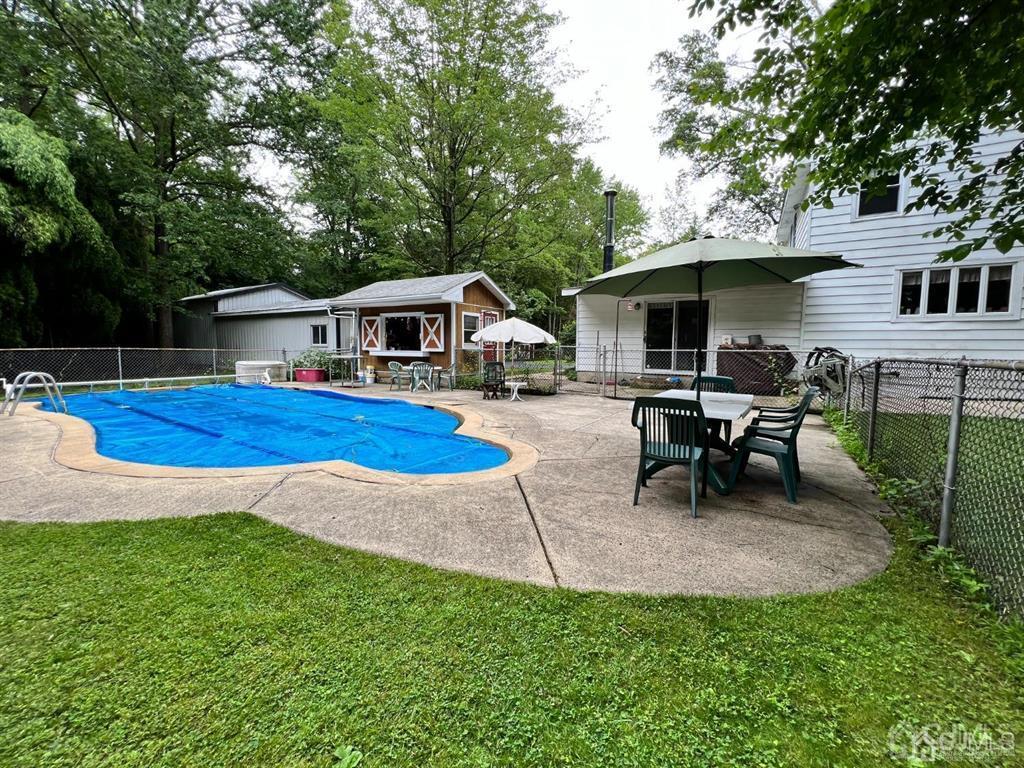 21 White Pine Road North Brunswick, NJ 08902 - Photo 31 of 33 a view of a house with backyard porch and sitting area