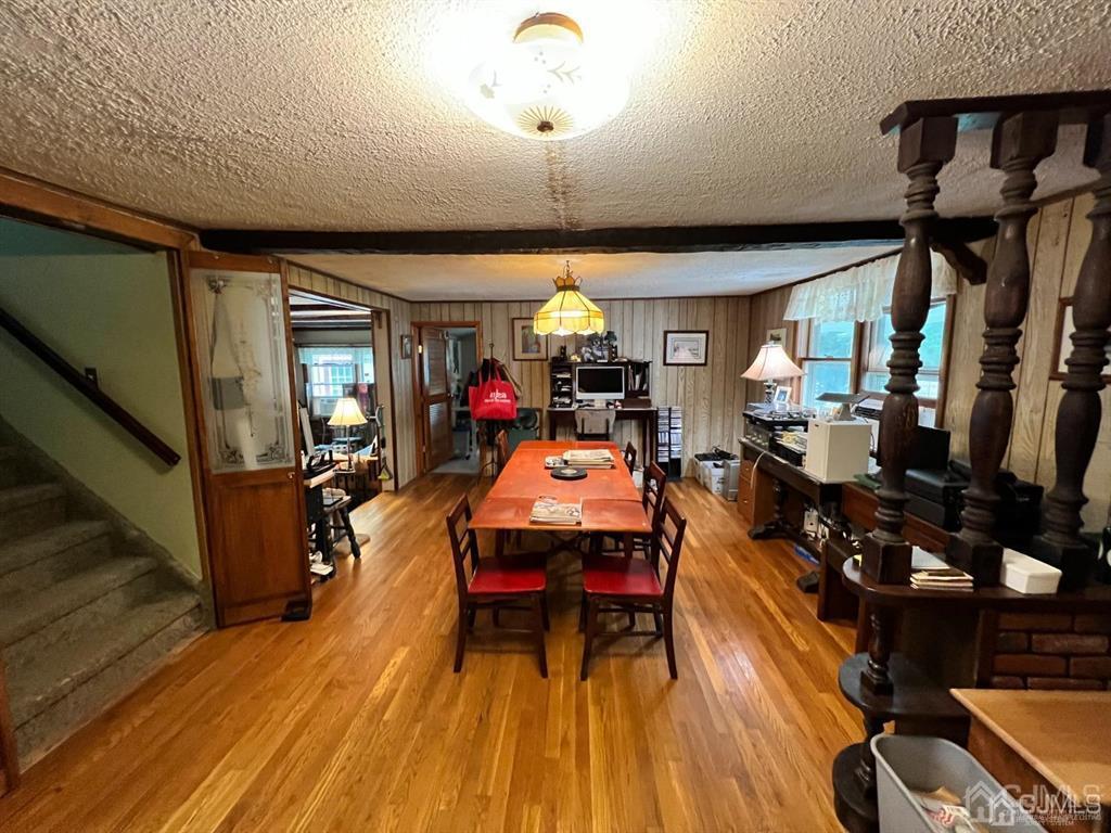 21 White Pine Road North Brunswick, NJ 08902 - Photo 9 of 33 a view of a dining room with furniture window and wooden floor