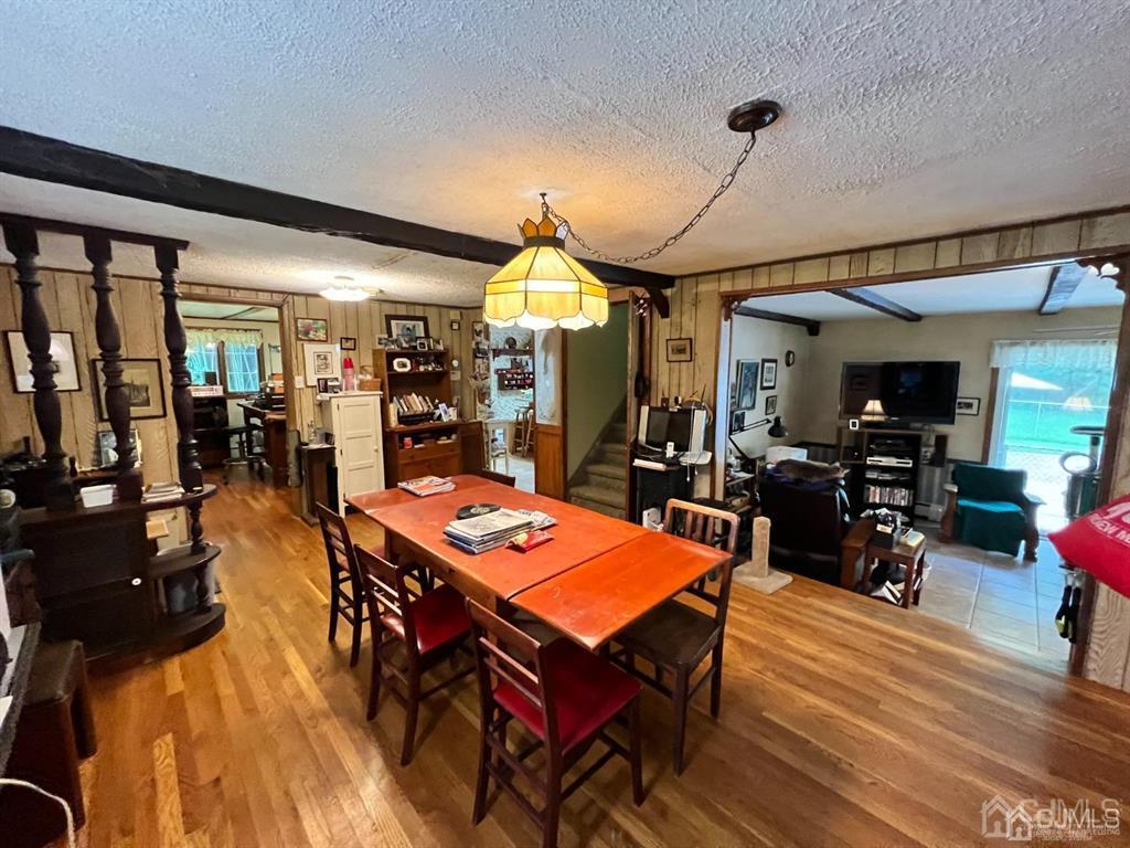 21 White Pine Road North Brunswick, NJ 08902 - Photo 10 of 33 a dinning area with furniture and wooden floor