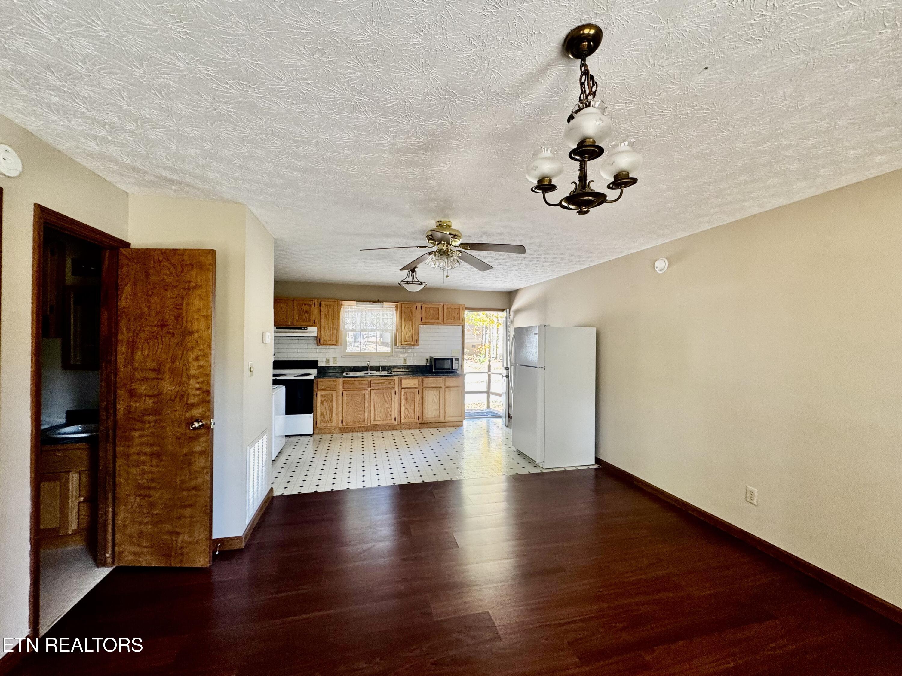 115 Bluegill Way Sevierville, TN 37876 - Photo 12 of 25 Family Room open to Kitchen