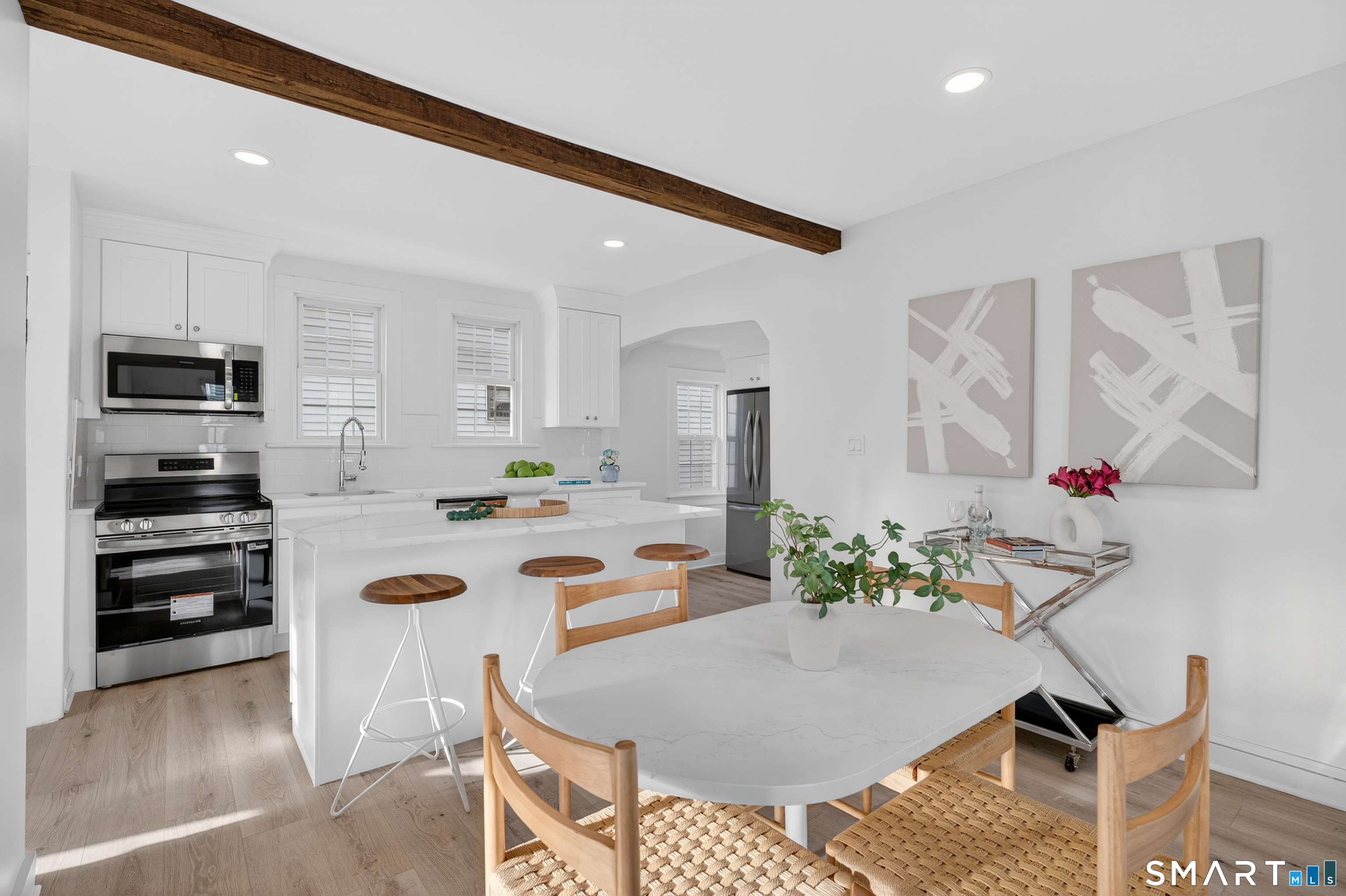 190 West Main Street Milford, CT 06460 - Photo 16 of 28 a living room with furniture and a flat screen tv