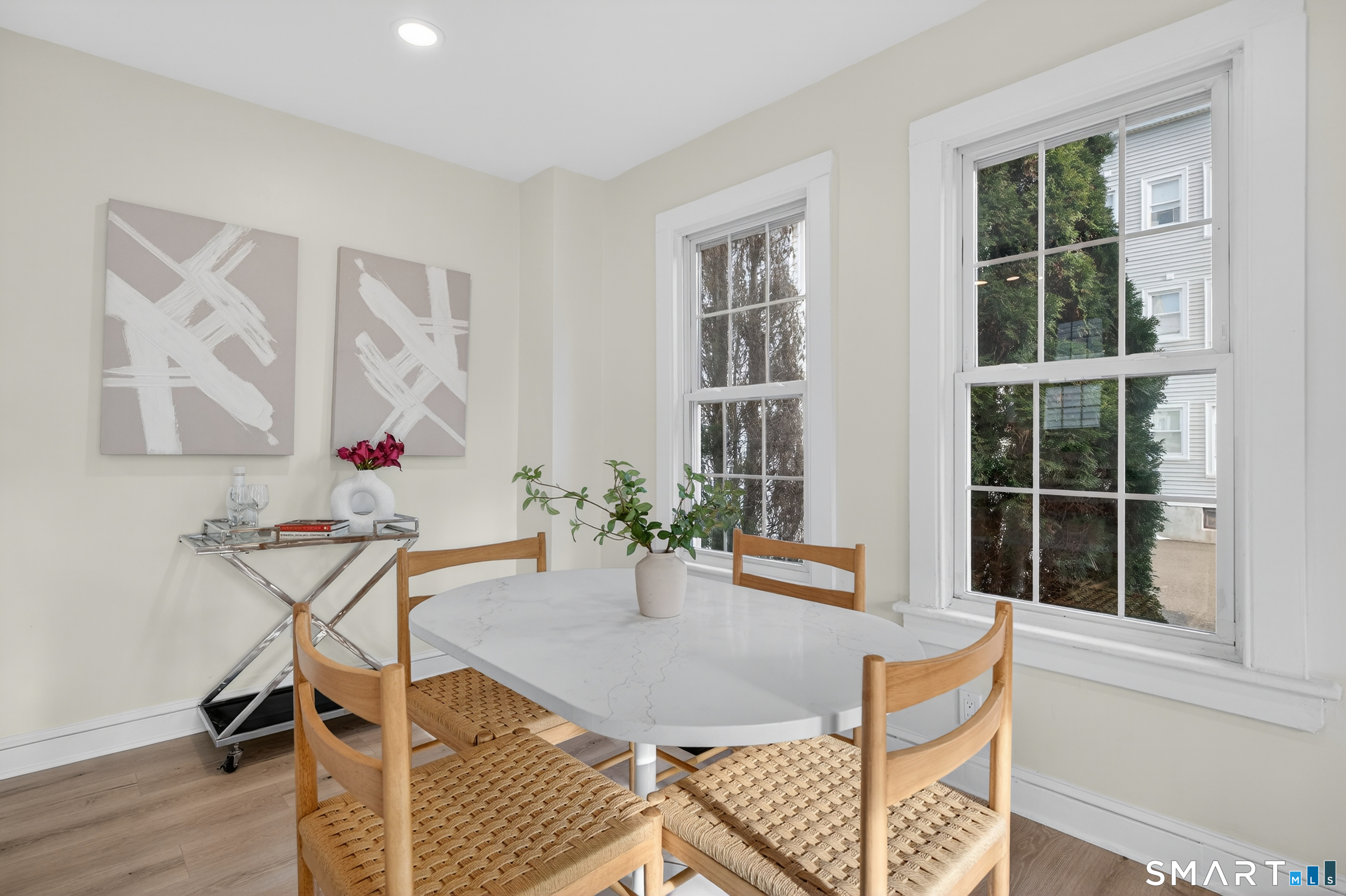 190 West Main Street Milford, CT 06460 - Photo 17 of 28 a dining room with furniture and wooden floor