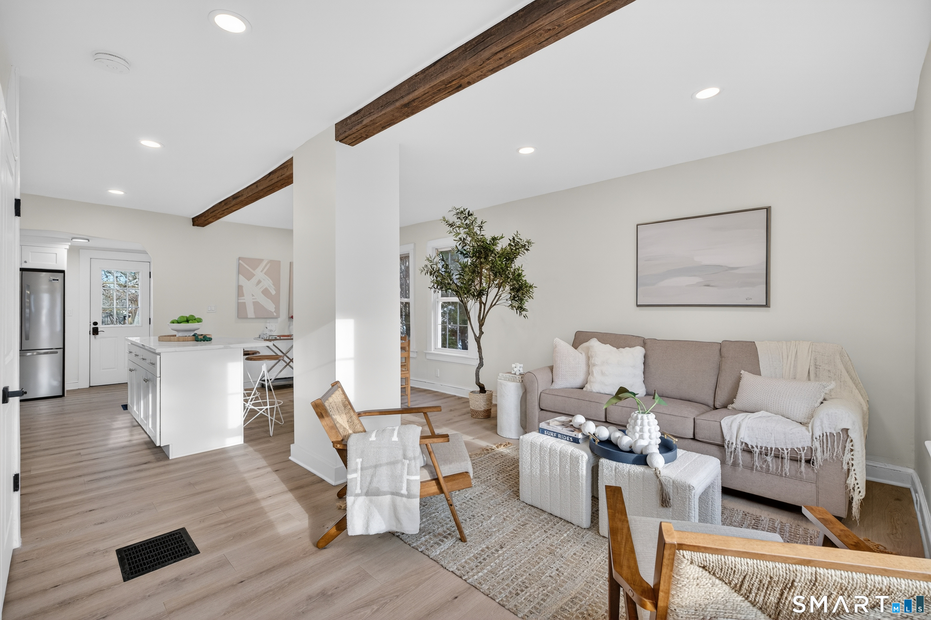 190 West Main Street Milford, CT 06460 - Photo 4 of 28 a living room with furniture and view of kitchen
