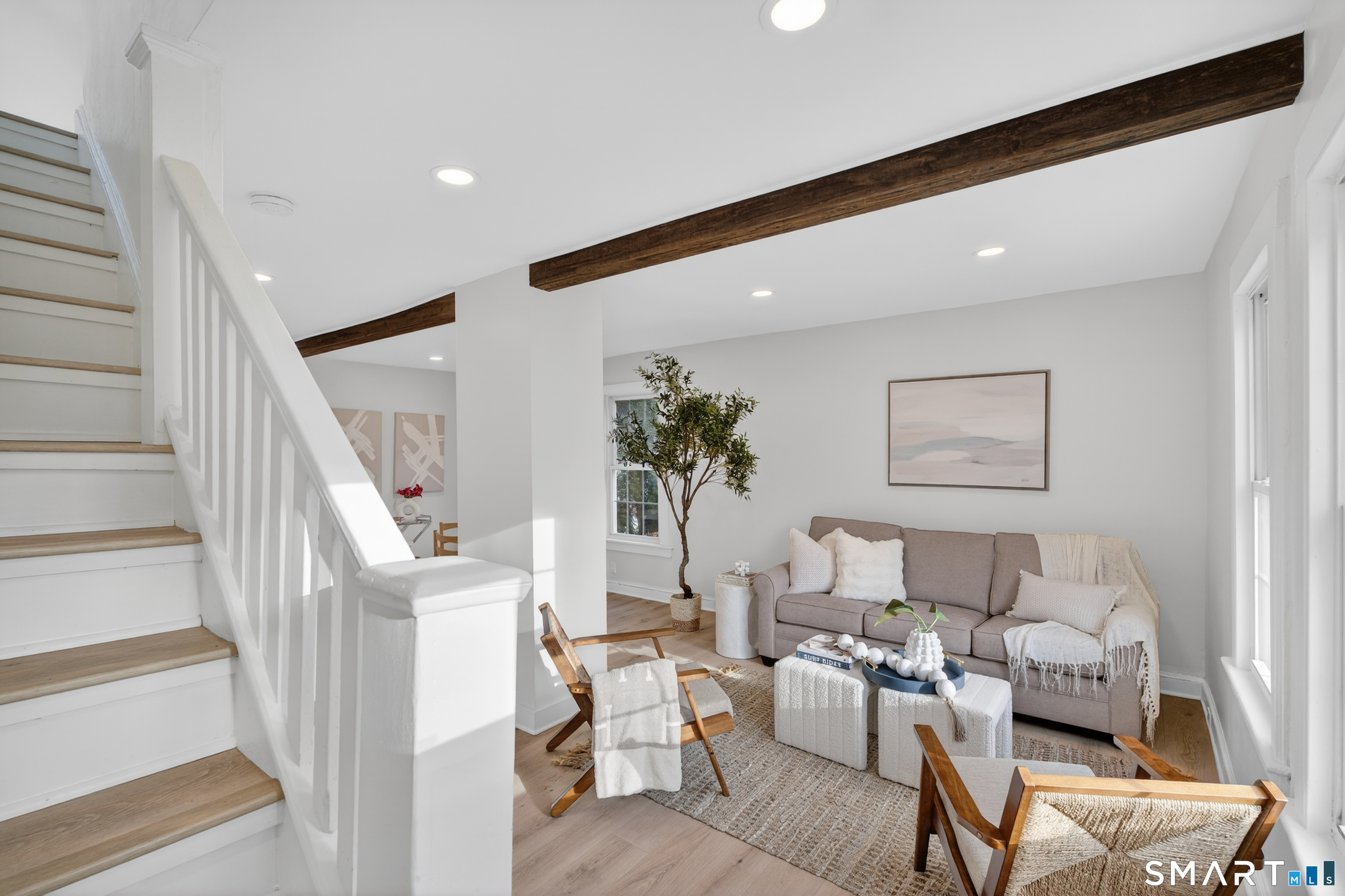 190 West Main Street Milford, CT 06460 - Photo 5 of 28 a living room with furniture and wooden floor