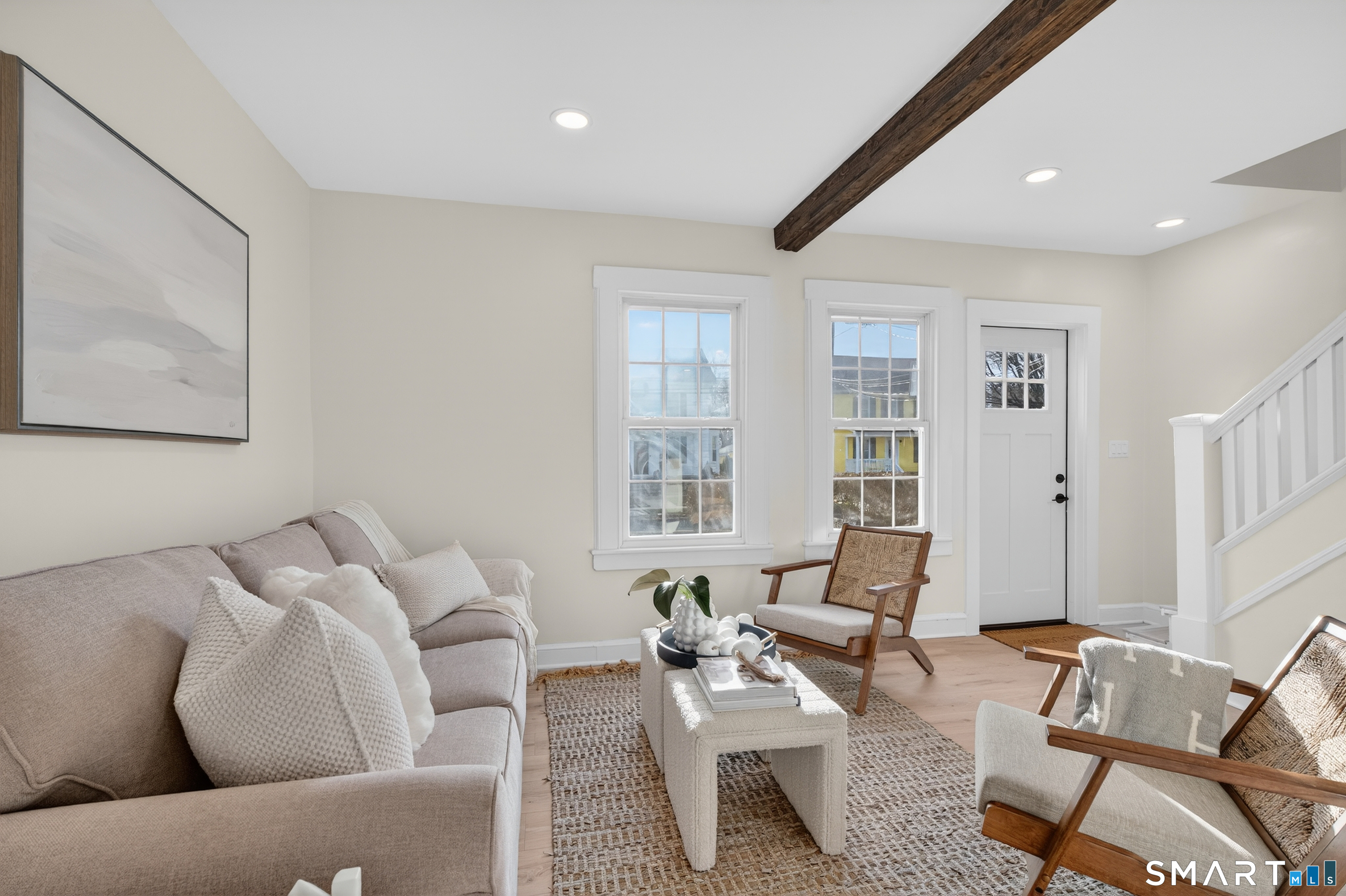 190 West Main Street Milford, CT 06460 - Photo 7 of 28 a living room with furniture and a window