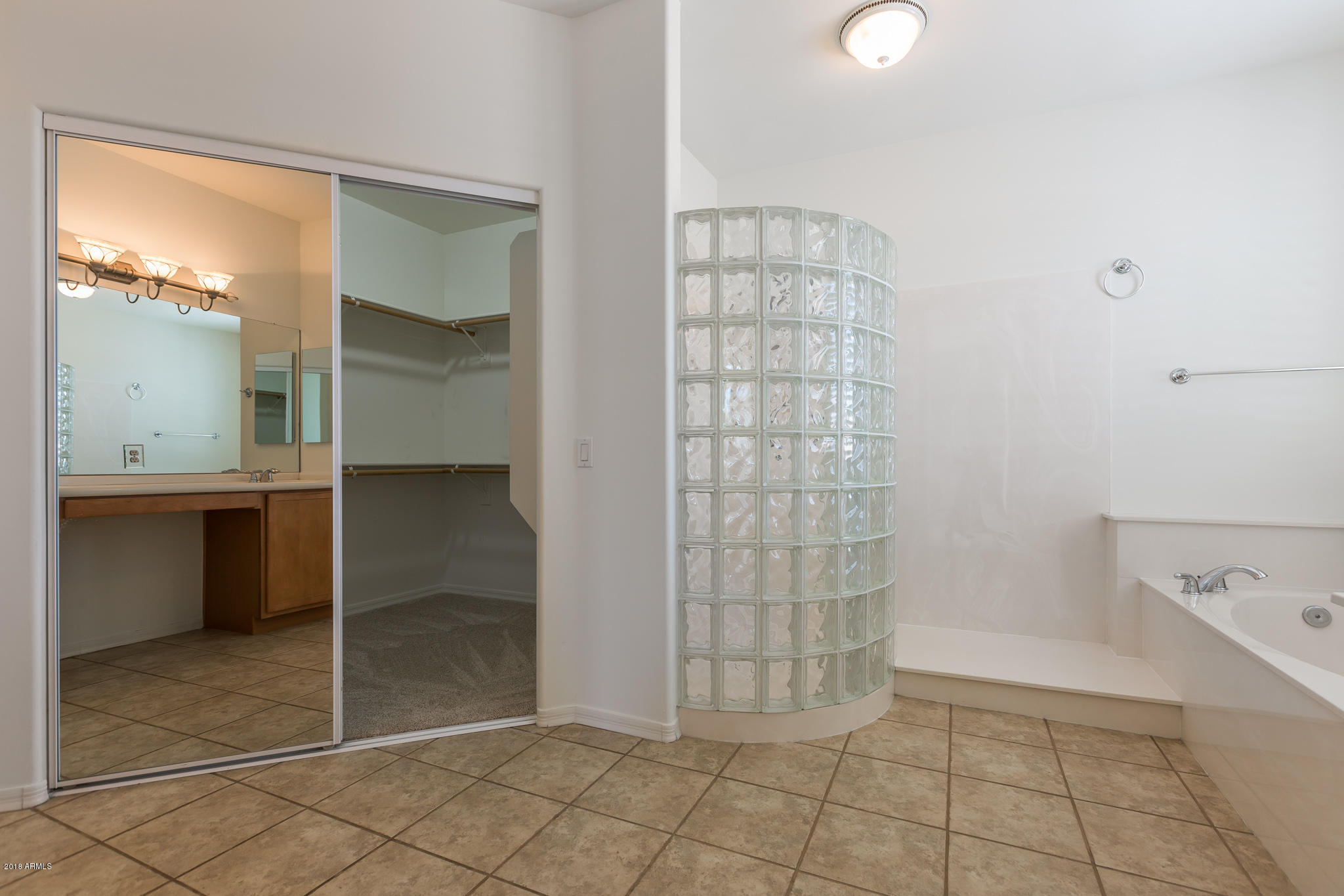 1750 East Ocotillo Road, Unit 23 Phoenix, AZ 85016 - Photo 14 of 27 a bathroom with a shower and a sink