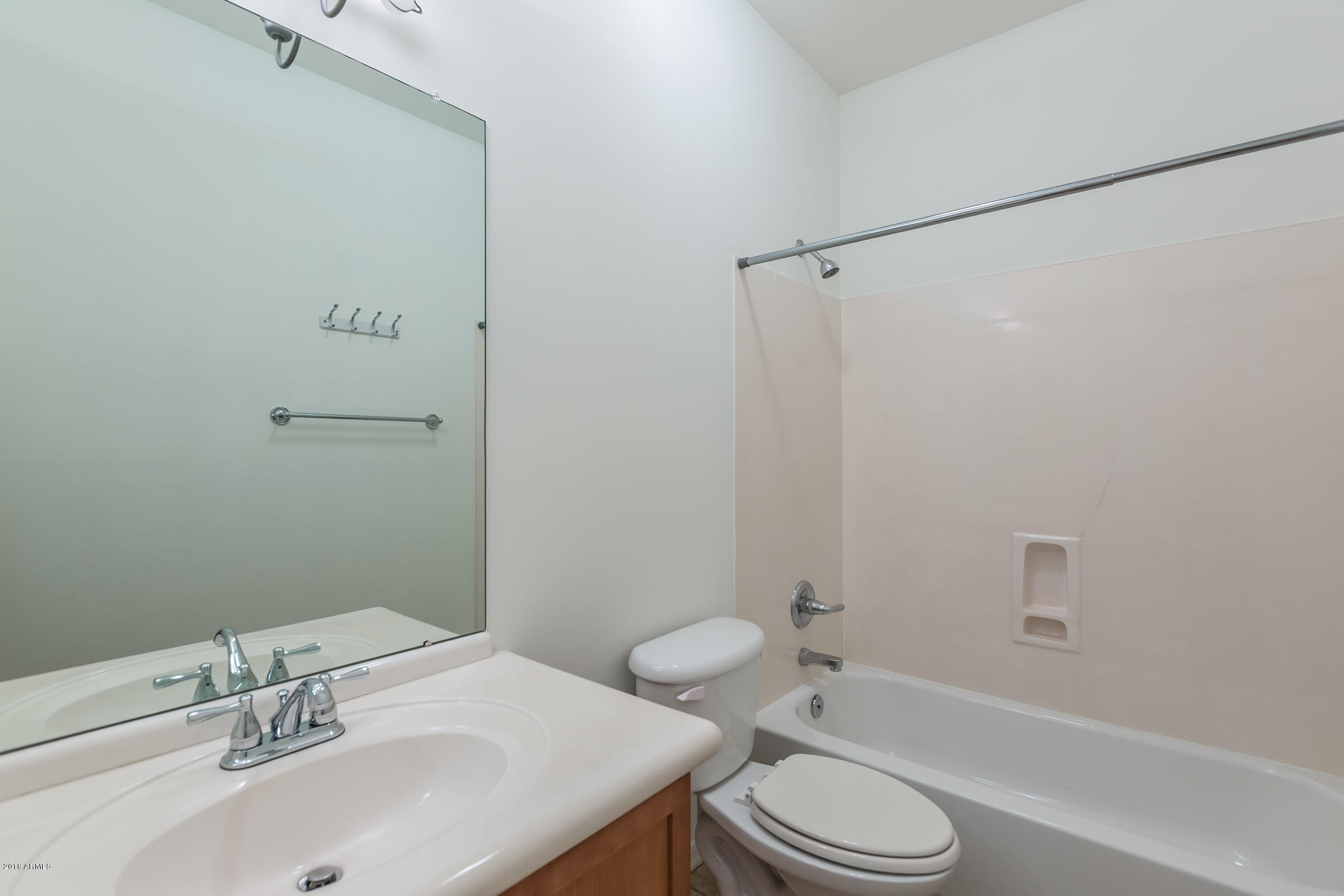 1750 East Ocotillo Road, Unit 23 Phoenix, AZ 85016 - Photo 17 of 27 a bathroom with a sink toilet and a bathtub