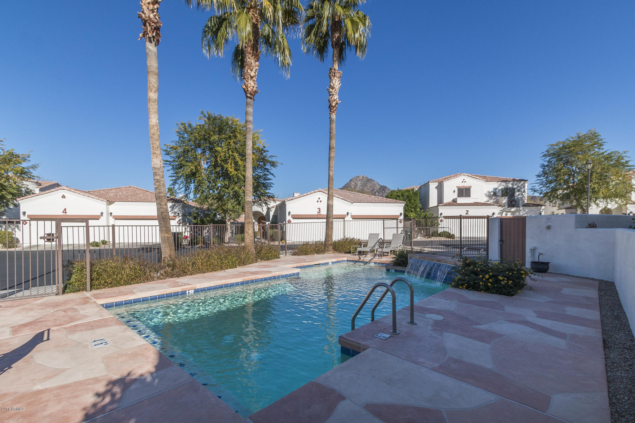 1750 East Ocotillo Road, Unit 23 Phoenix, AZ 85016 - Photo 26 of 27 a view of a backyard with sitting area
